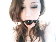Ball-gagged excessive drooling