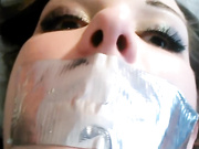 Tape-gagged masturbation