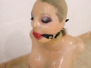 Latex girl tied to the sybian