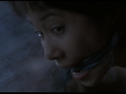 Tied, gagged scene from hong kong movie