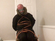 Chair bound (self) wearing black n3b parka