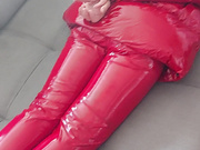Slave tied in shiny puffer