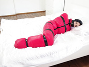 struggling in red sleepsack