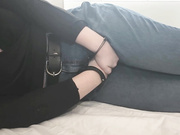 Bound girl desperately wets her jeans in bed